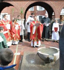 Palm Sunday procession starting in the newly-constructed courtyard